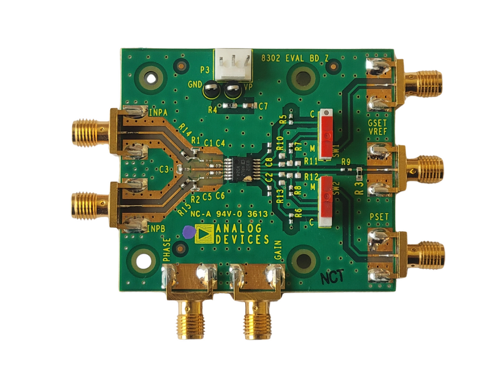 Green circuit board with gold connectors on a white background, featuring Analog Devices logo.