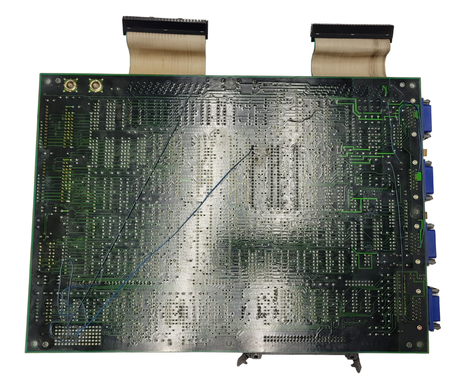 Electronic circuit board with various connectors on a white background