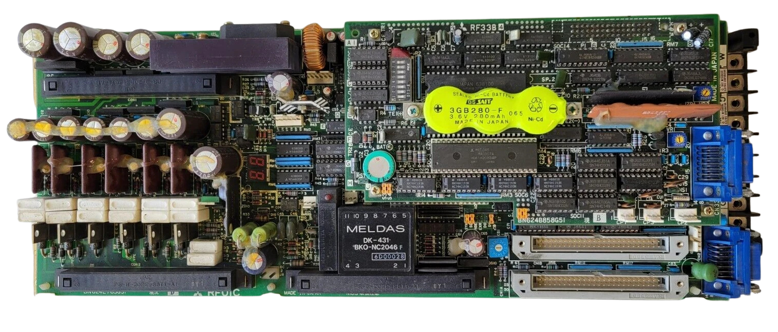 Computer motherboard with various components on a white background