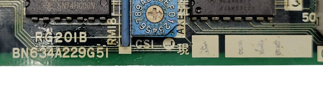 Close-up of a computer motherboard with various components and labels.