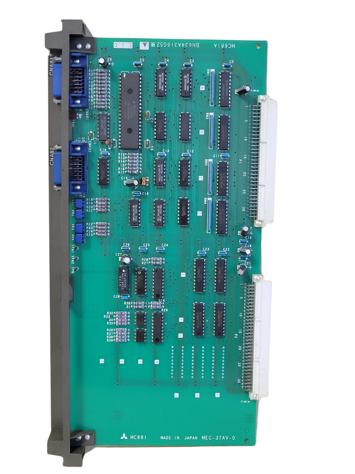 Electronic circuit board with various components on a white background