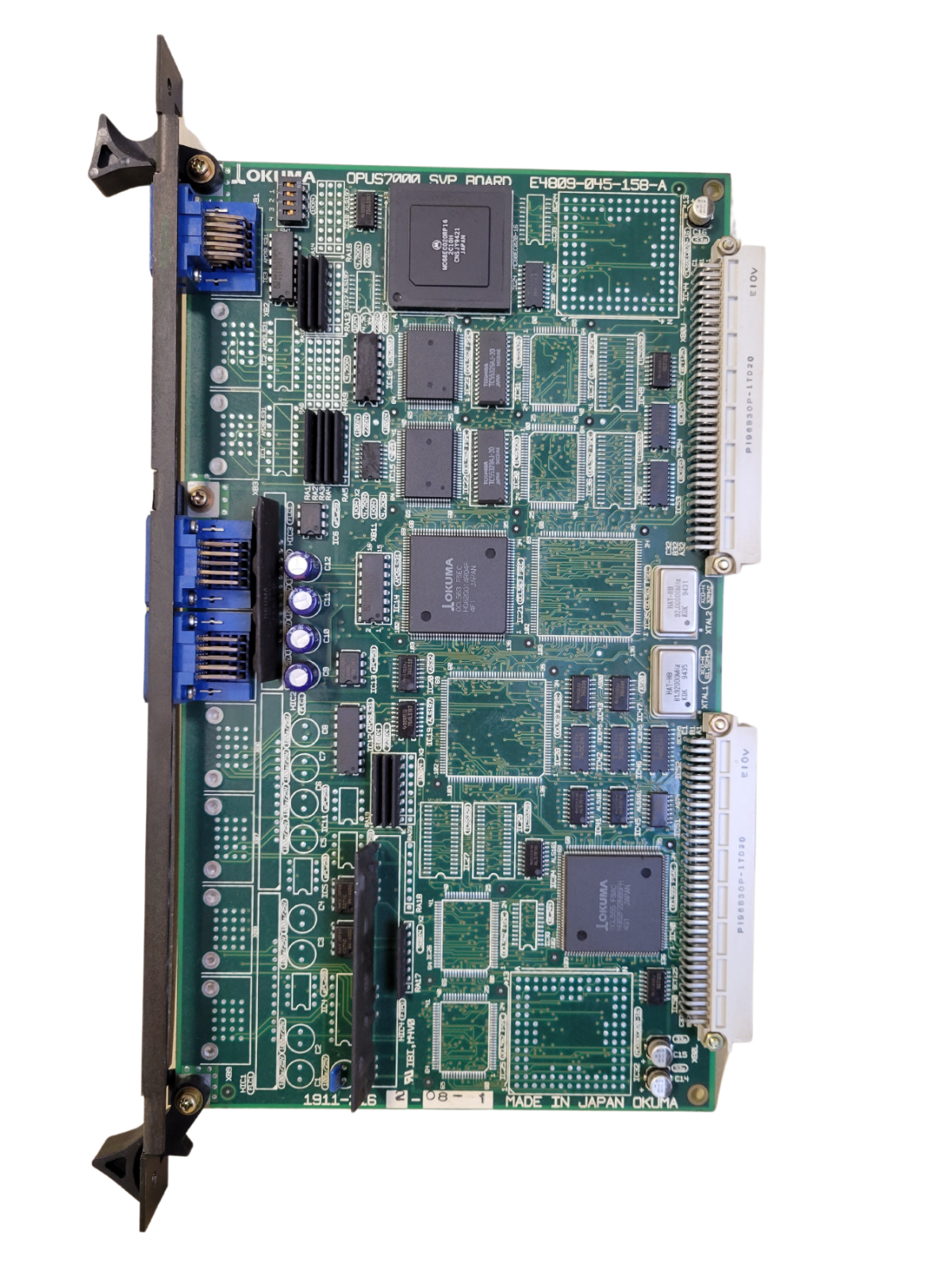 Electronic circuit board with various components on a white background