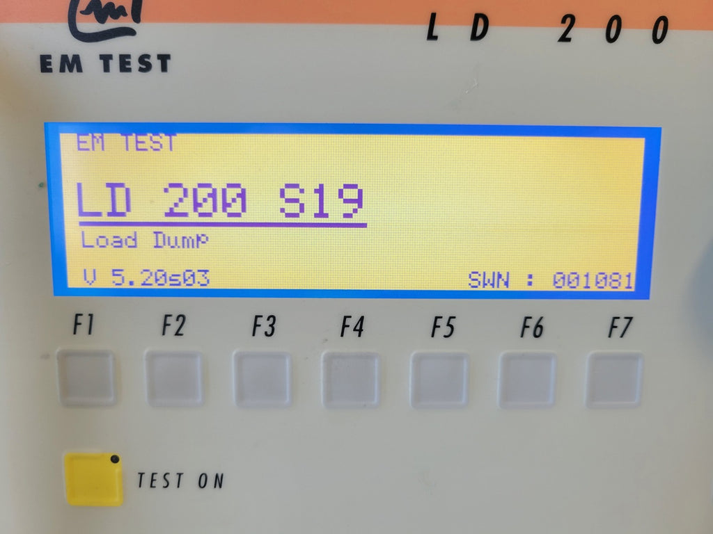 Electrical test equipment display showing 'LD 200 S19' and 'EM TEST'.