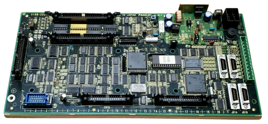 Electronic circuit board with various components on a white background