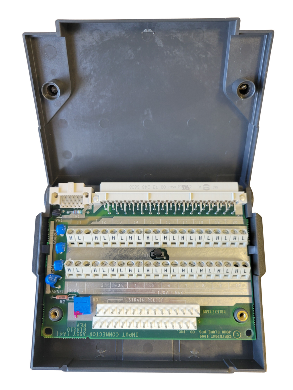 Electrical panel with various connectors and wiring on a white background