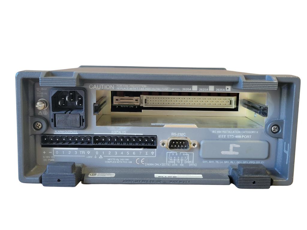 Back view of a electronic device with connectors and labels on a white background