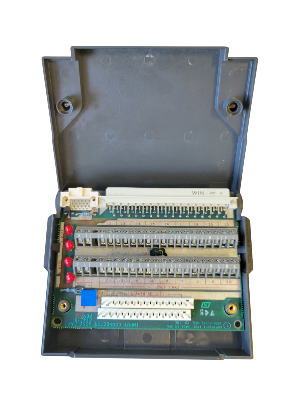 Electronic module with connectors and components on a white background