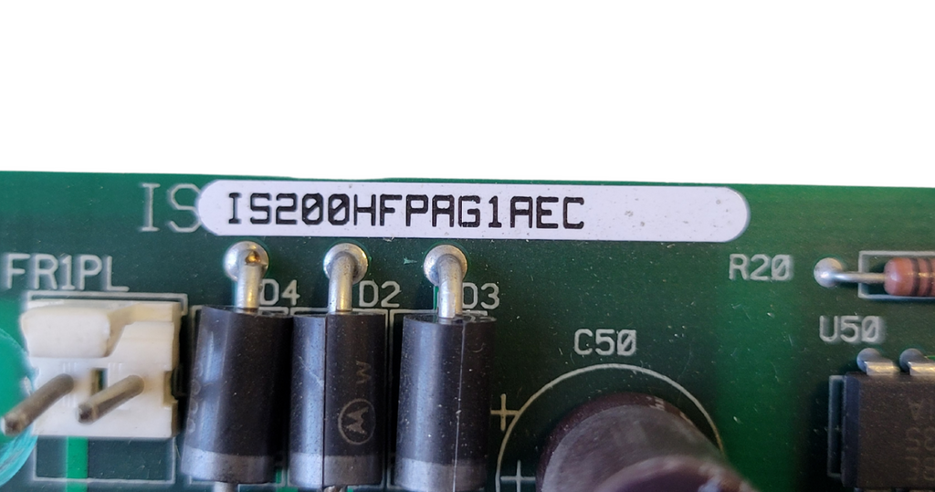 Close-up of a circuit board with electronic components and text.
