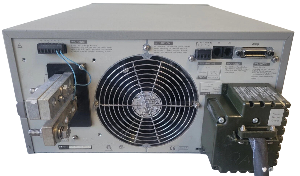 Back view of a electronic equipment with a fan and connectors on a white background