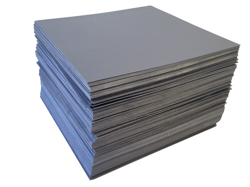 Stack of metal sheets on a white background