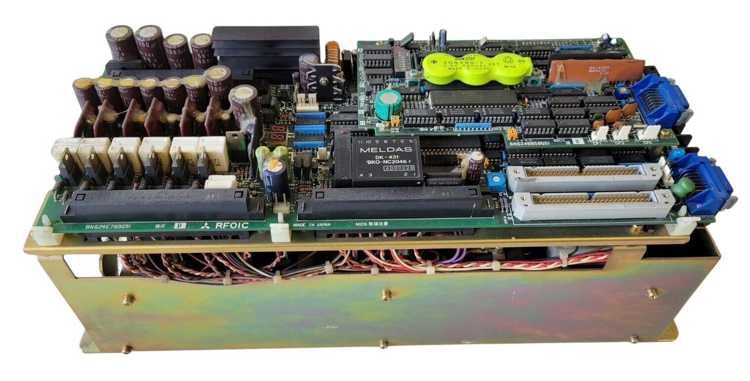 Electronic circuit board with various components on a white background