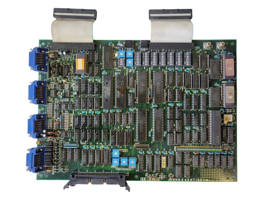Electronic circuit board with various components on a white background