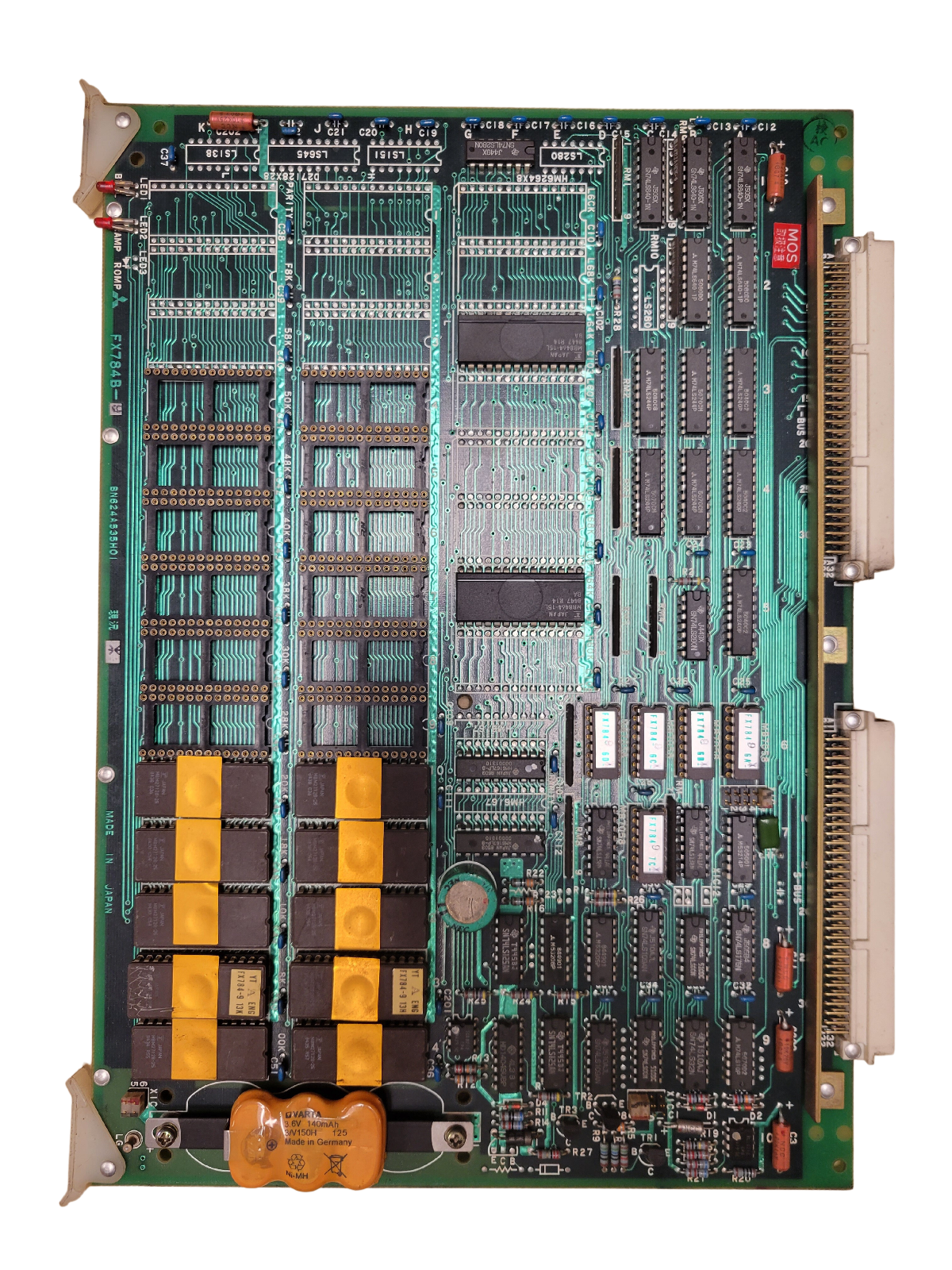 Electronic circuit board with various components on a white background