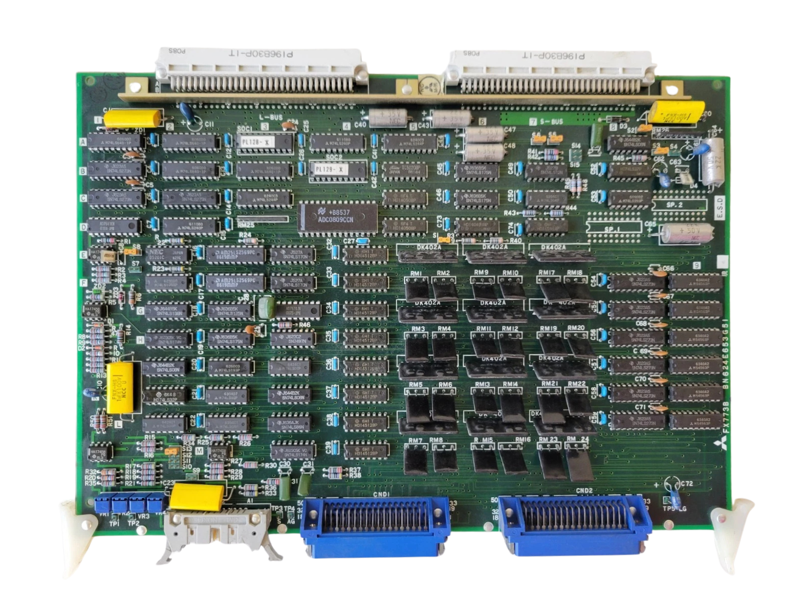 Electronic circuit board with various components on a white background