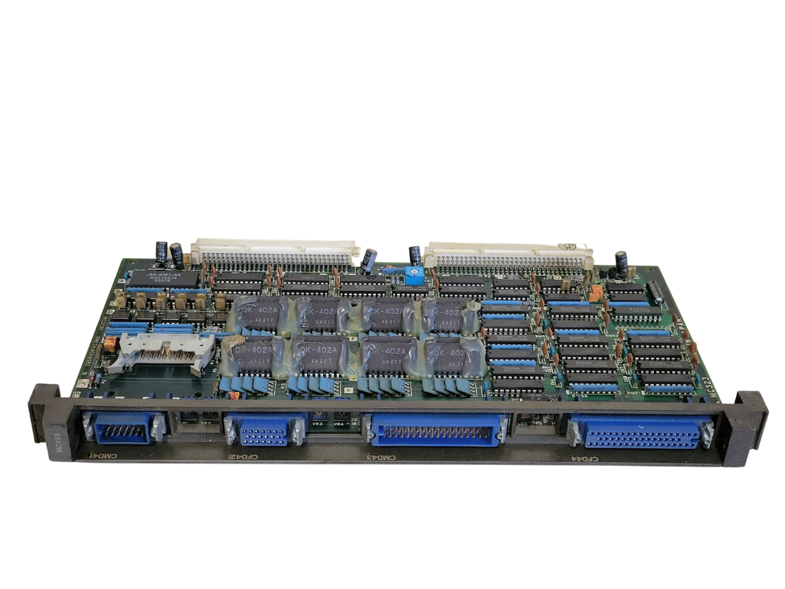 Electronic circuit board with various components on a white background