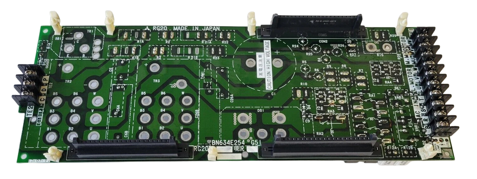 Green electronic circuit board with various components on a white background