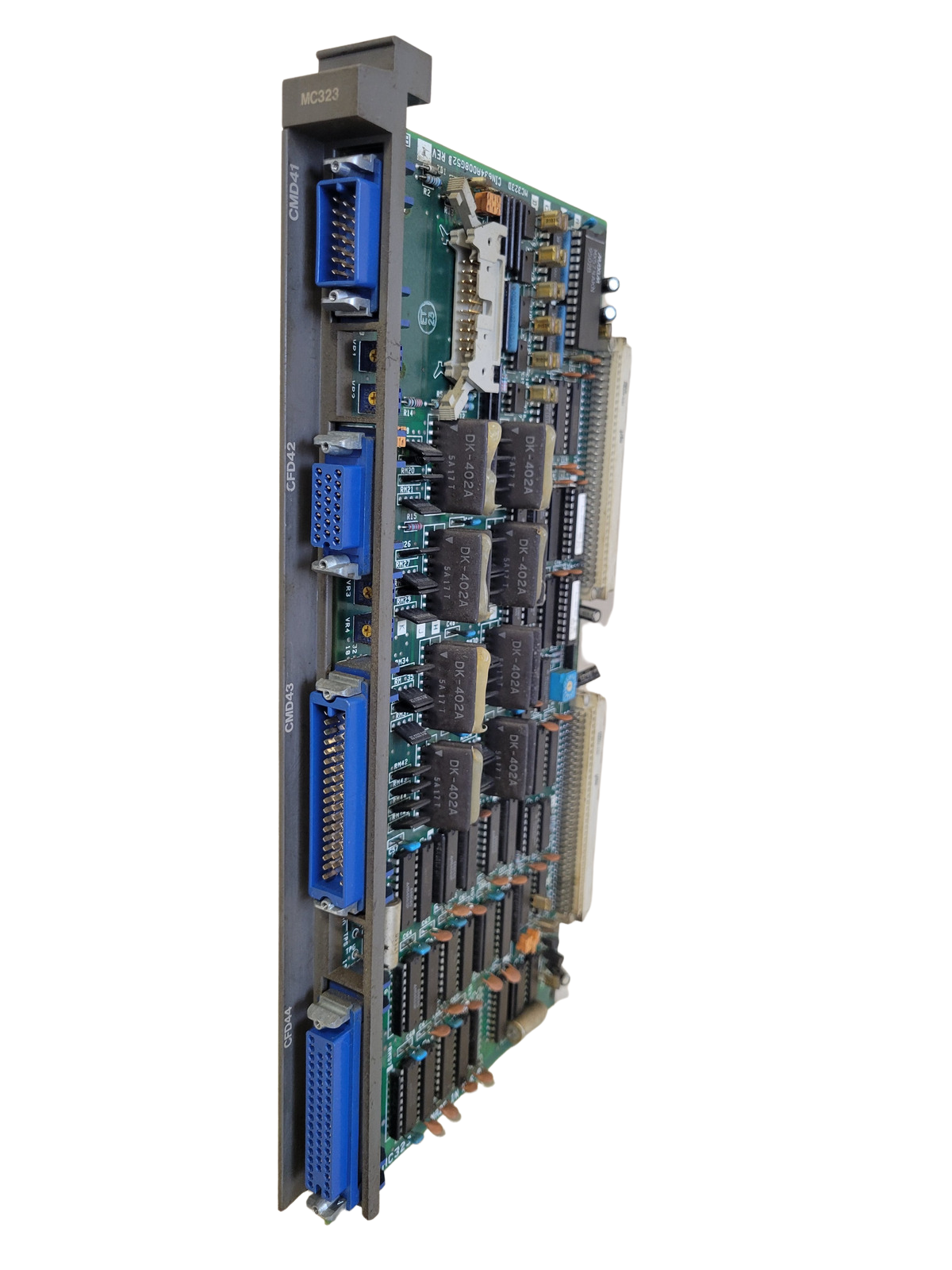 Electronic circuit board with various components on a white background