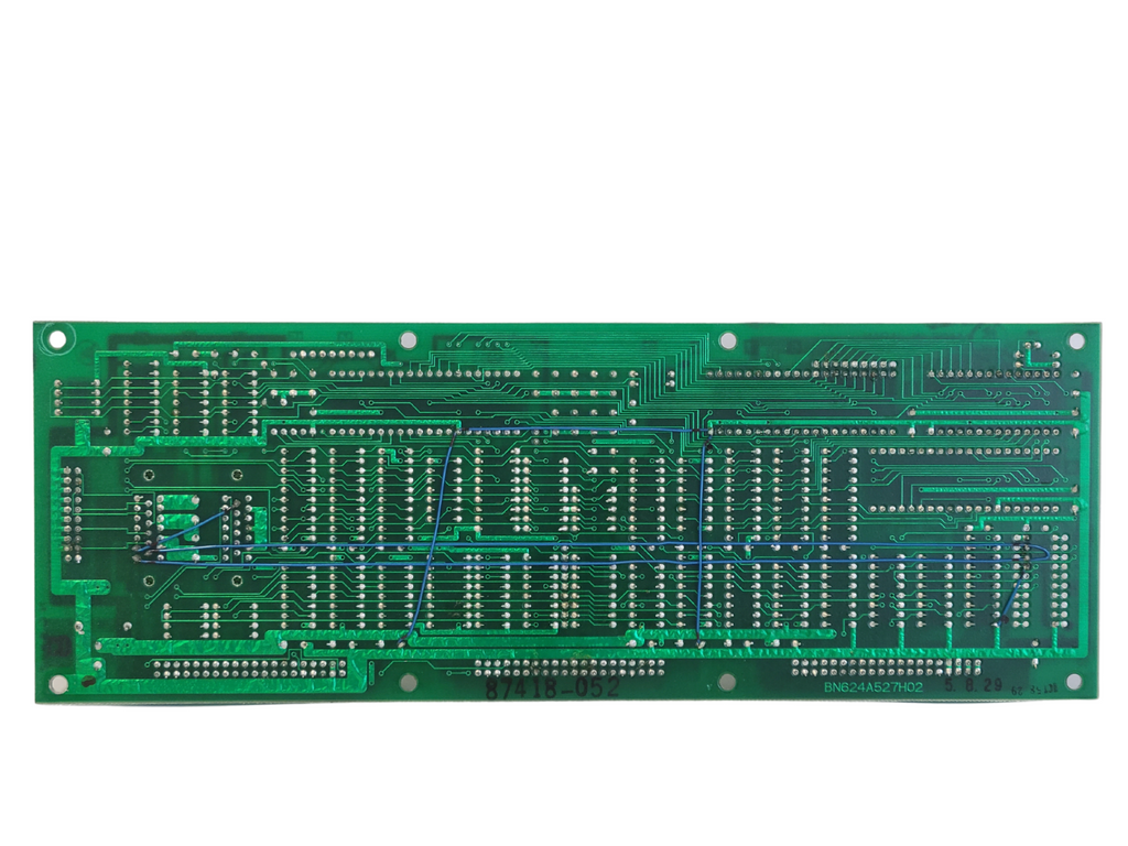 Green printed circuit board on a white background