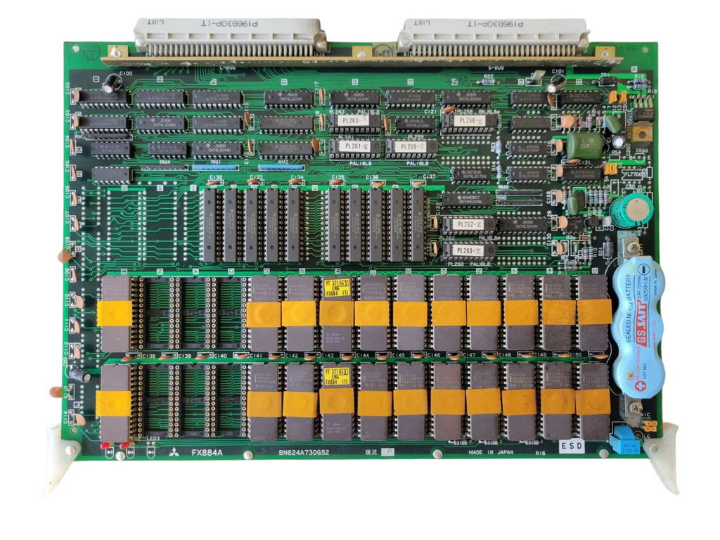 Electronic circuit board with various components on a white background
