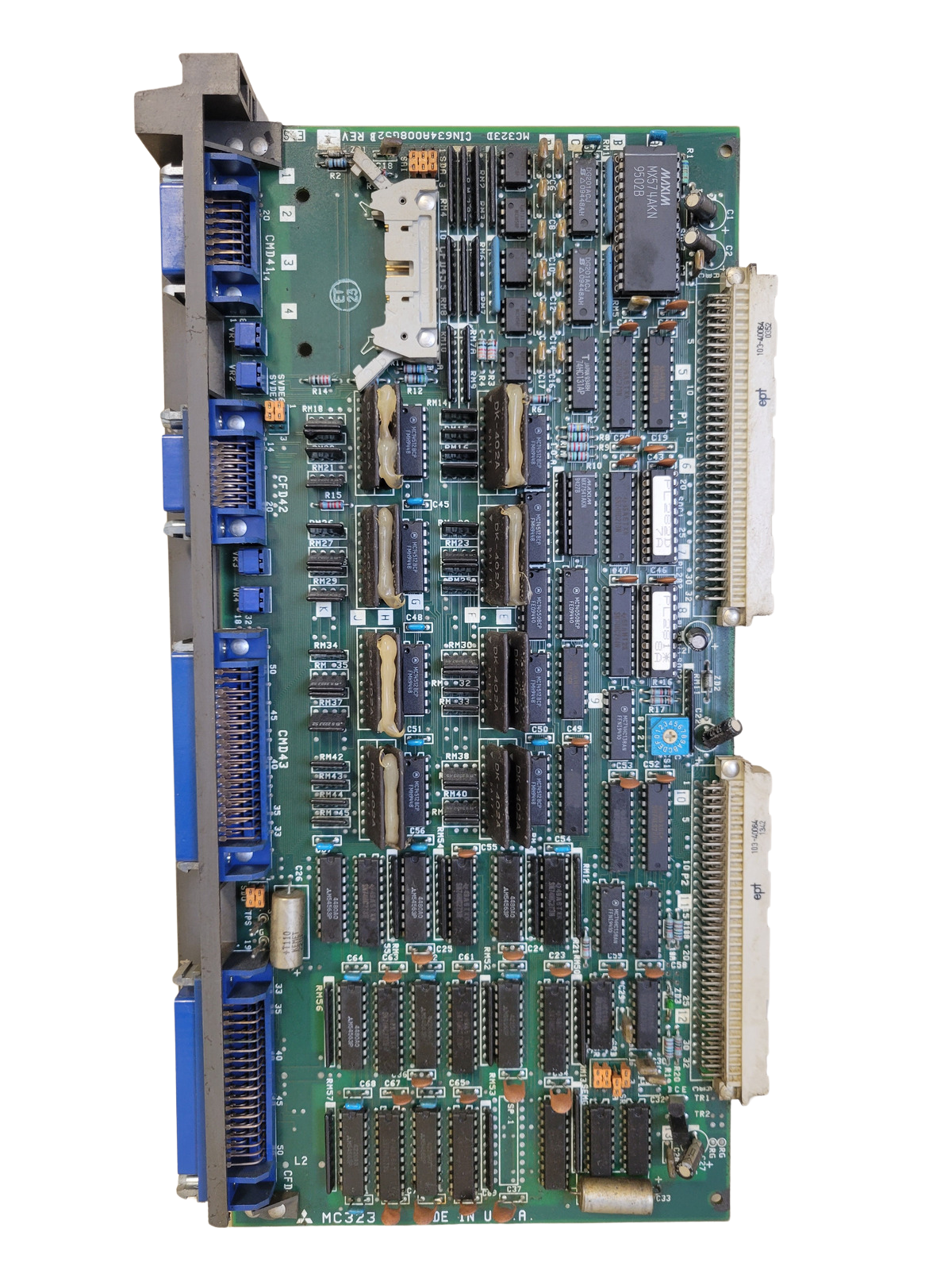 Electronic circuit board with various components on a white background
