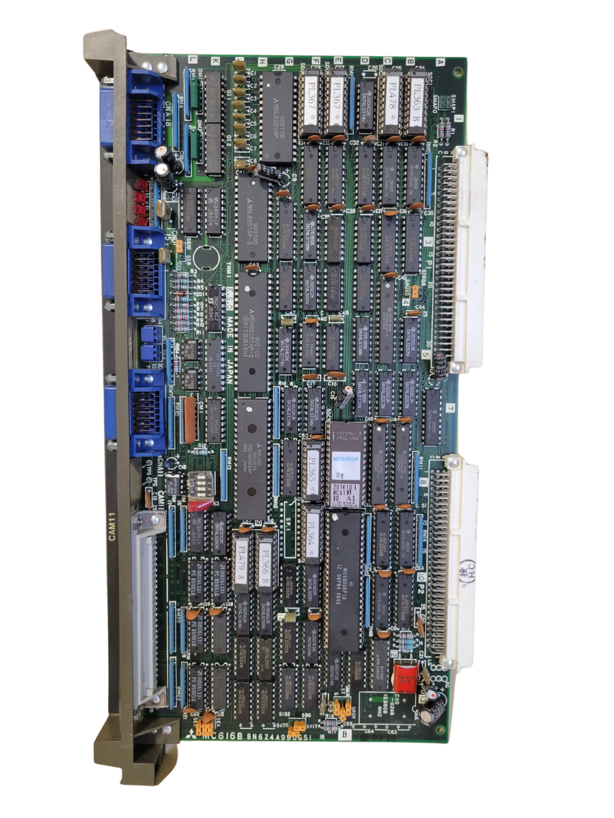 Complex electronic circuit board with various components on a white background