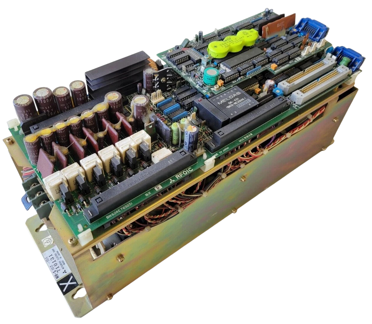 Complex electronic circuit board with various components on a white background