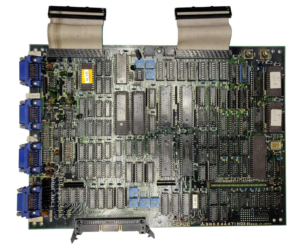 Electronic circuit board with various components on a white background