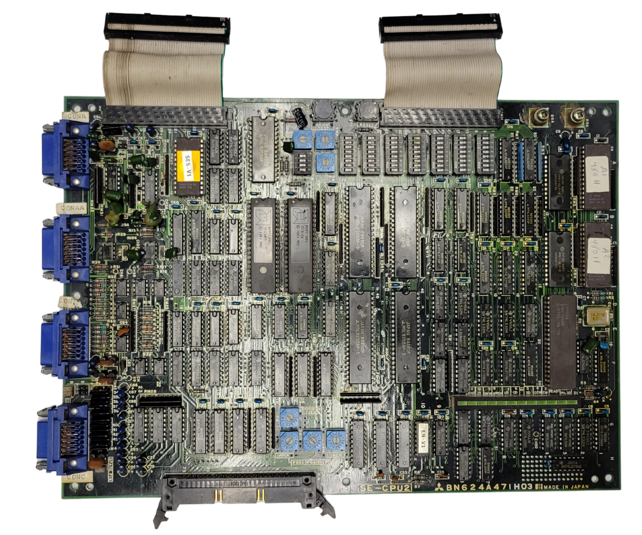 Electronic circuit board with various components on a white background