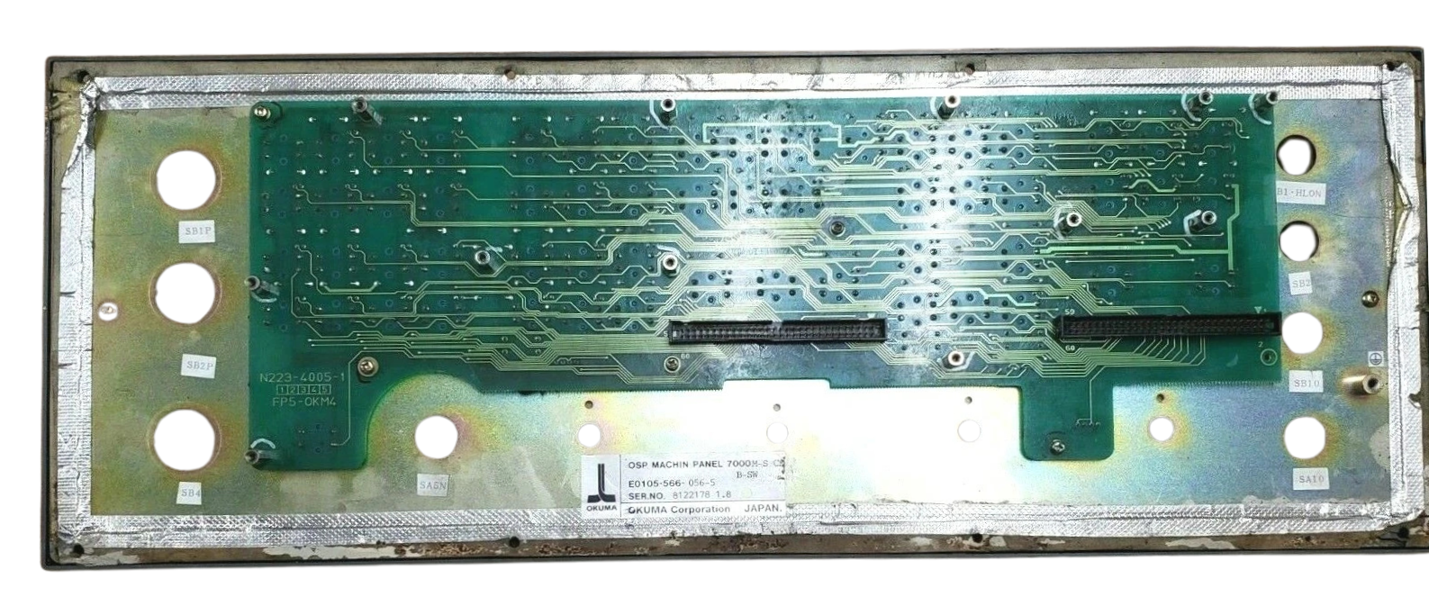 Electronic circuit board with various components on a metallic frame