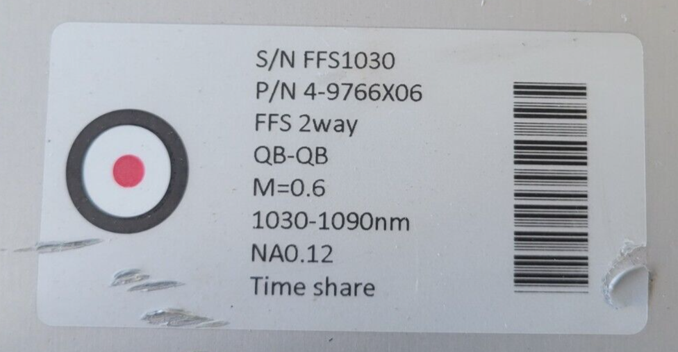 Technical label with text and barcode on a white background