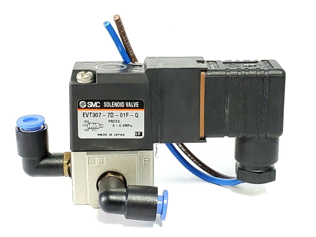 SMC solenoid valve with wiring on a white background