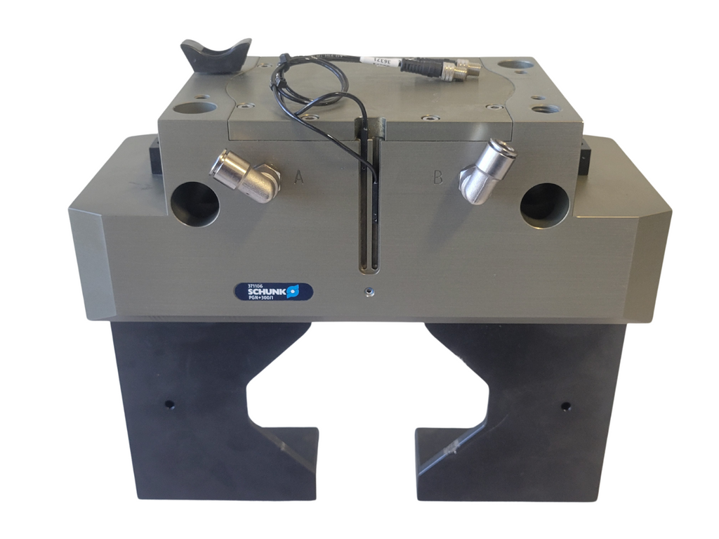 Metalworking machine tool with Schunk branding on a white background