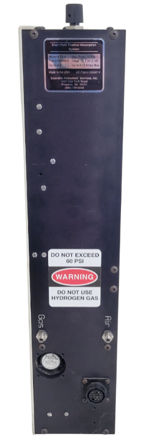 Rectangular metal device with warning labels on a white background