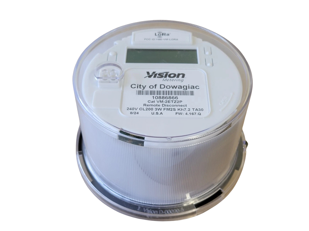 White electronic meter with digital display on a white background